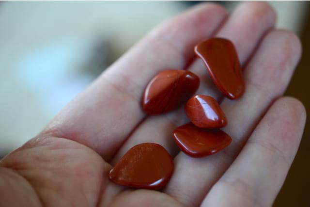 Girl Holding Red Jasper - Grounding Crystal